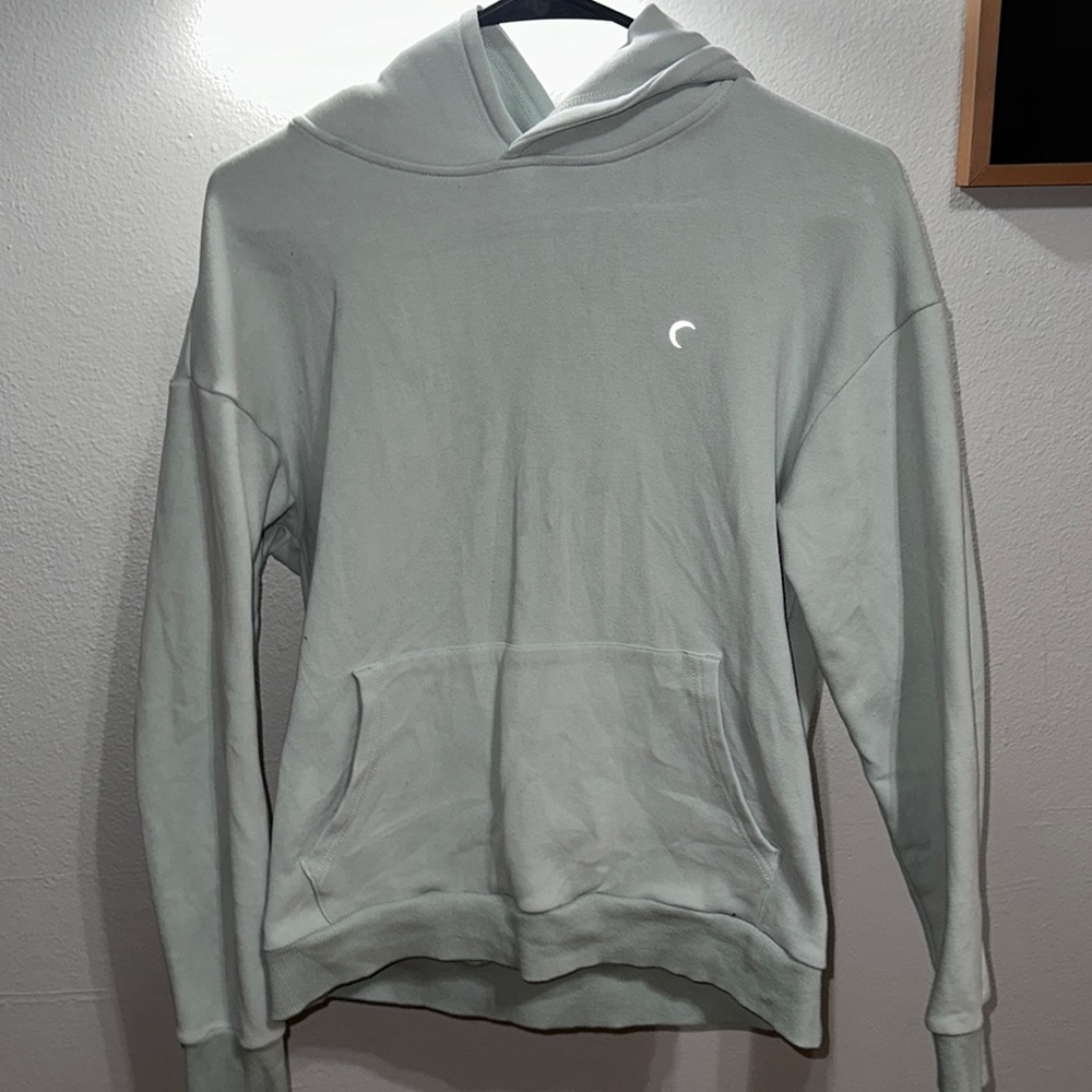 ZYIA Active light olive green hoodie. Size women’s medium.